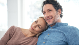 Man and woman sitting together